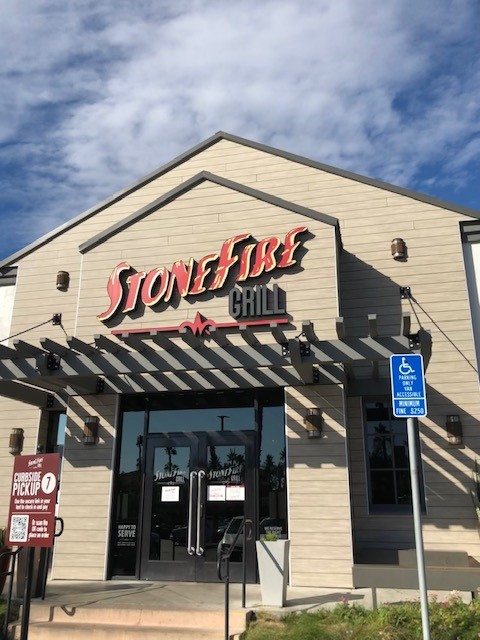 The front of a StoneFire Grill barbecue restaurant.